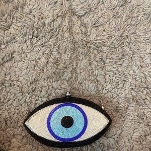Evil eye clutch